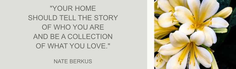 An image featuring a quote by Nate Berkus on the left that reads, "Your home should tell the story of who you are & be a collection of what you love." On the right side, there is a close-up of yellow and white flowers.